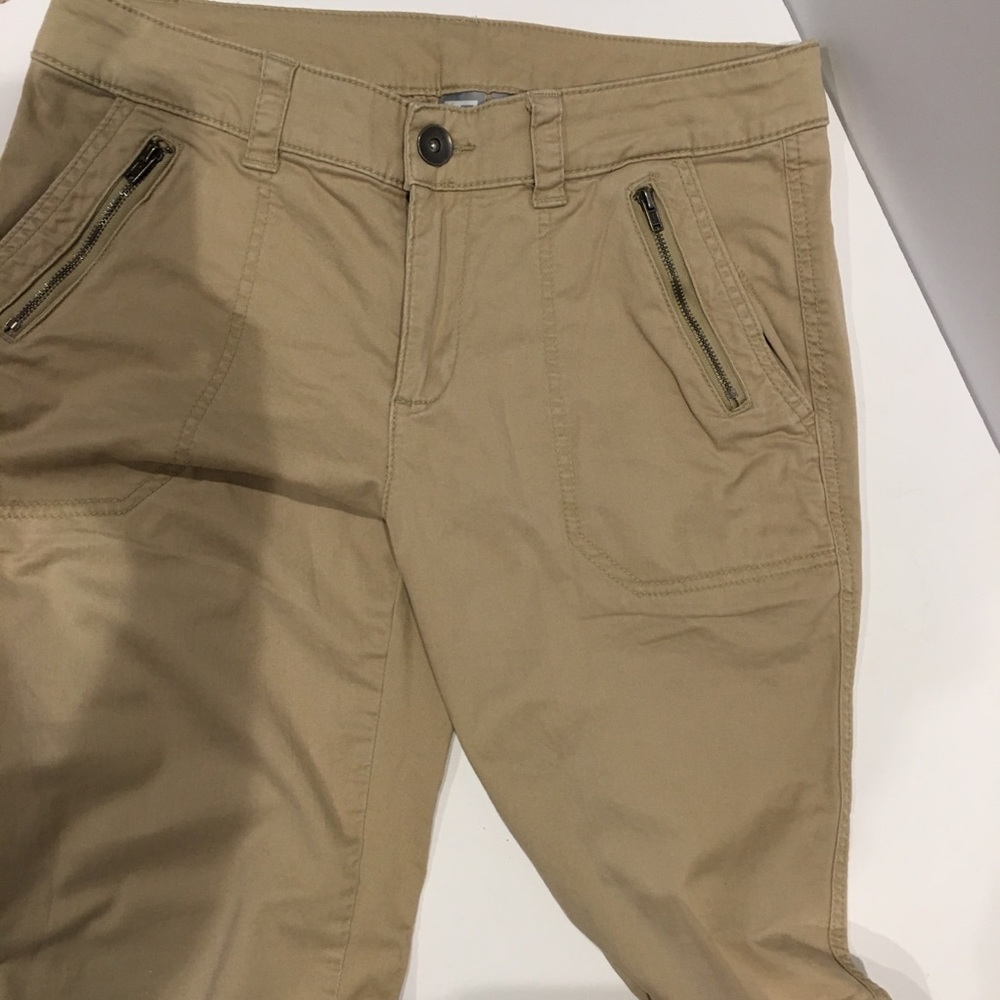 Like New khaki pants w/zipper pockets. Size 6